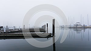 Boating docks on a cold, misty morning