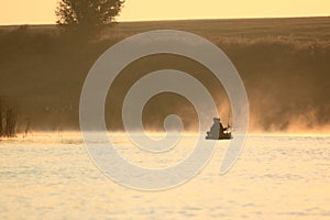 Boating on the lake in a huge fog