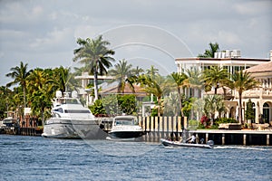 Boating by luxury mansions in Fort Lauderdale FL