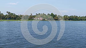 Boating through Vembanad lake in kerala, India.