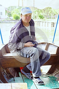 Boatman in a pleasure boat, on the Danube River, Vilkovo, Ukraine