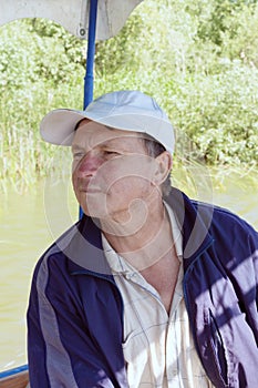 Boatman in a pleasure boat, on the Danube River, Vilkovo, Ukraine