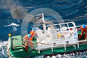 Boatman working on deck supply boat, crews operation on installation boat