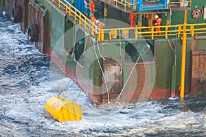 Boatman working on deck supply boat, crews operation on installation boat