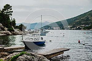 Boats in the Adriatic sea near Dubrovnik city on a sunset. Travel destination in Croatia