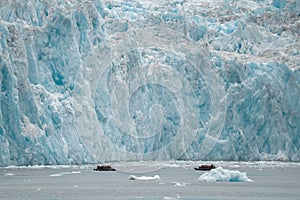 Boats against glaciers in Inside Passage, Alaska