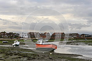 Boats aground at Emsworth, Hampshire