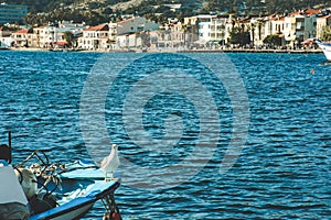 Boats along the coastline of resort town of Foca. Foca, Turkey - August 2022