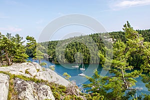 Boats at anchor in Covered Portage, Killarney