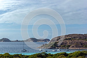 Boats are on anchor at lucky bay. Overlooking Lucky Bay in Cape Le Grand National Park, Esperance, Australia