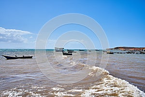 Boats anchored at the beach. Coche Island, Venezuela photo