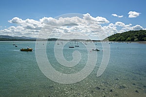 Boats anchored in the clear water of Menai Strait - 1