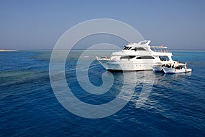 Boats anchored on coral reef