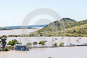 Boats anchored at the harbor of the flooded Gariep Dam