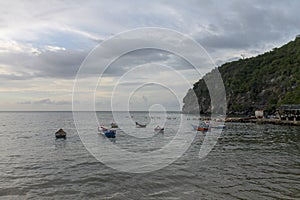Boats anchored off the coast of Rio Caribe photo