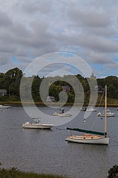 Boats anchored in a quaint Cape Cod waterway