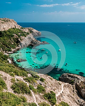 Boats on azure sea near Baunty beach