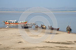 Boats on the banks of the Irrawaddy river. Bagan. Myanmar