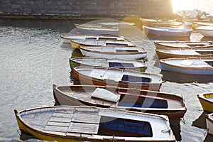 Boats in the Bay of Naples at sunset, Campania, Italy
