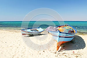 Boats on the beach photo