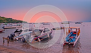 Boats on the beach at Gili Trawangan in Indonesia at sunset