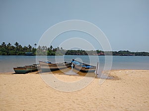 Boats on the beach, golden sand beach Poovar Thiruvananthapuram Kerala