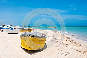 Boats at the beach of Progreso near Merida in Mexico photo