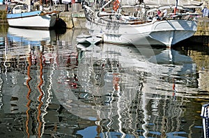 Boats and big reflections in the sea of Honfleur i