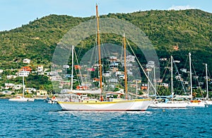 Boats and big yacht in marina next to Bequia island in Saint Vincent and the Grenadines