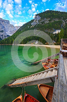 Boats on the Braies Lake Pragser Wildsee in Dolomites mounta