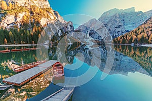Boats on the Braies Lake  Pragser Wildsee  in Dolomites mountains, Sudtirol, Italy photo
