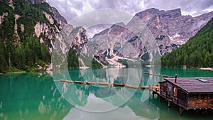 Boats on the Braies Lake Pragser Wildsee in Dolomites mountains, Sudtirol, Italy. Alps nature