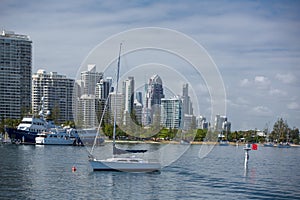 Boats on the broadwater with modern city skyline in the background