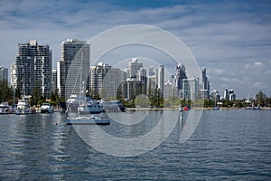 Boats on the broadwater with modern city skyline in the background