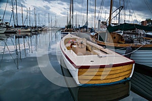 Boats on calm waters of marina
