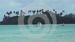 Boats & catamaran or Hobie cat yachts sailing on Muri Lagoon Reef Rarotonga Island