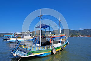 Boats at the channel of the historic town Paraty, Rio de Janeiro state, Brazil