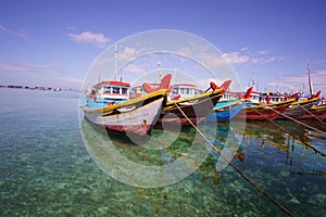 Boats on the clear sea