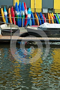 Boats and colorful canoes / kayaks