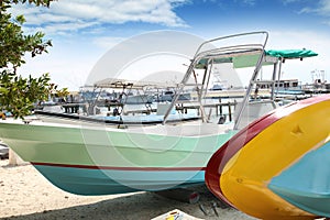 Boats colorful in Isla Mujeres beach Mexico
