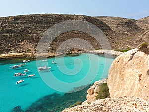 Boats in crystalline water