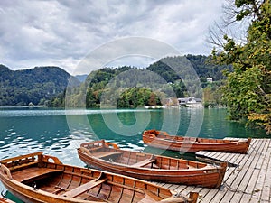 boats on dark water of lake Bled. Slovenia