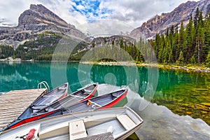 Boats on Dock at Lake O`Hara in the Canadian Rockies of Yoho National Park