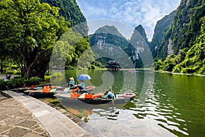 Boats dock in Trang An, Ninh Binh province, Vietnam