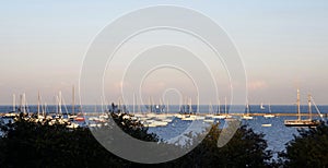 Boats docked, anchored and moored in a Harbor