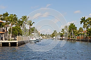 Boats docked on canal