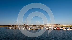 Boats in Esbjerg Strand marina, Esbjerg city, Jutland, Denmark, on North Sea coast photo