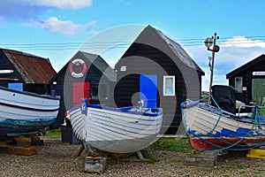 Boats and Fishermens Huts in Southwold Harbour, Suffolk, UK