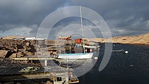 Boats on the fishing harbor on the ocean coast in southern Sweden