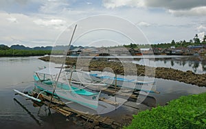 Boats with a fishing village